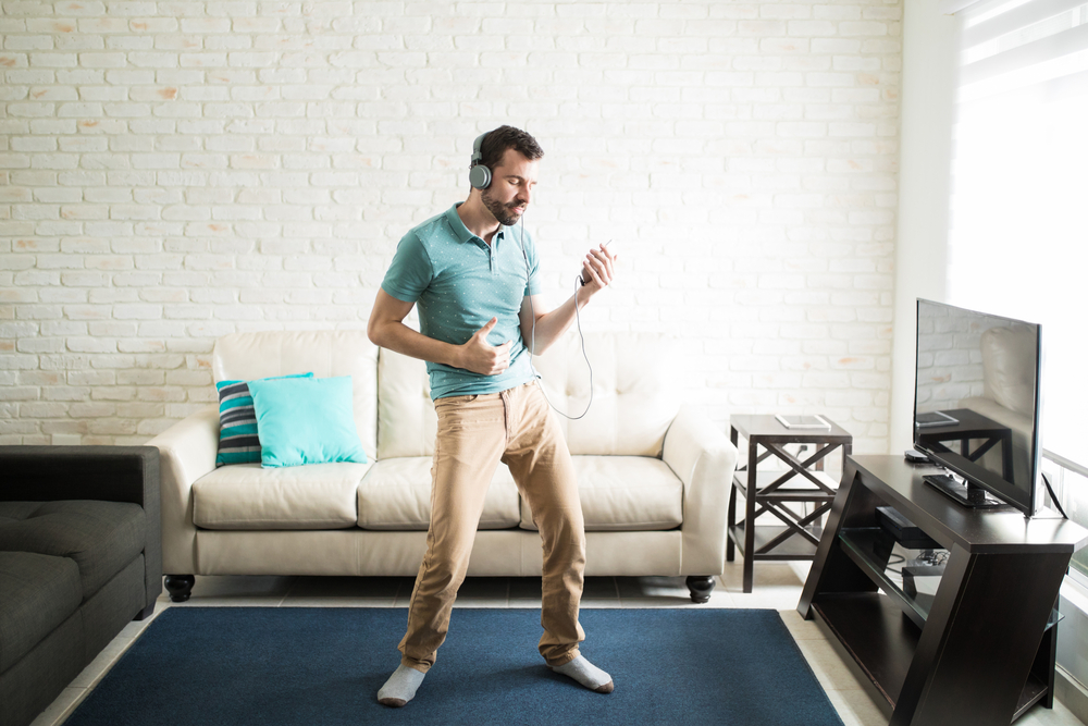 man dancing in living room