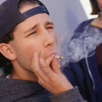 teenage boy smoking marijuana