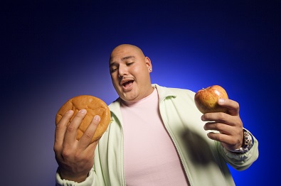 Man holding hamburgers